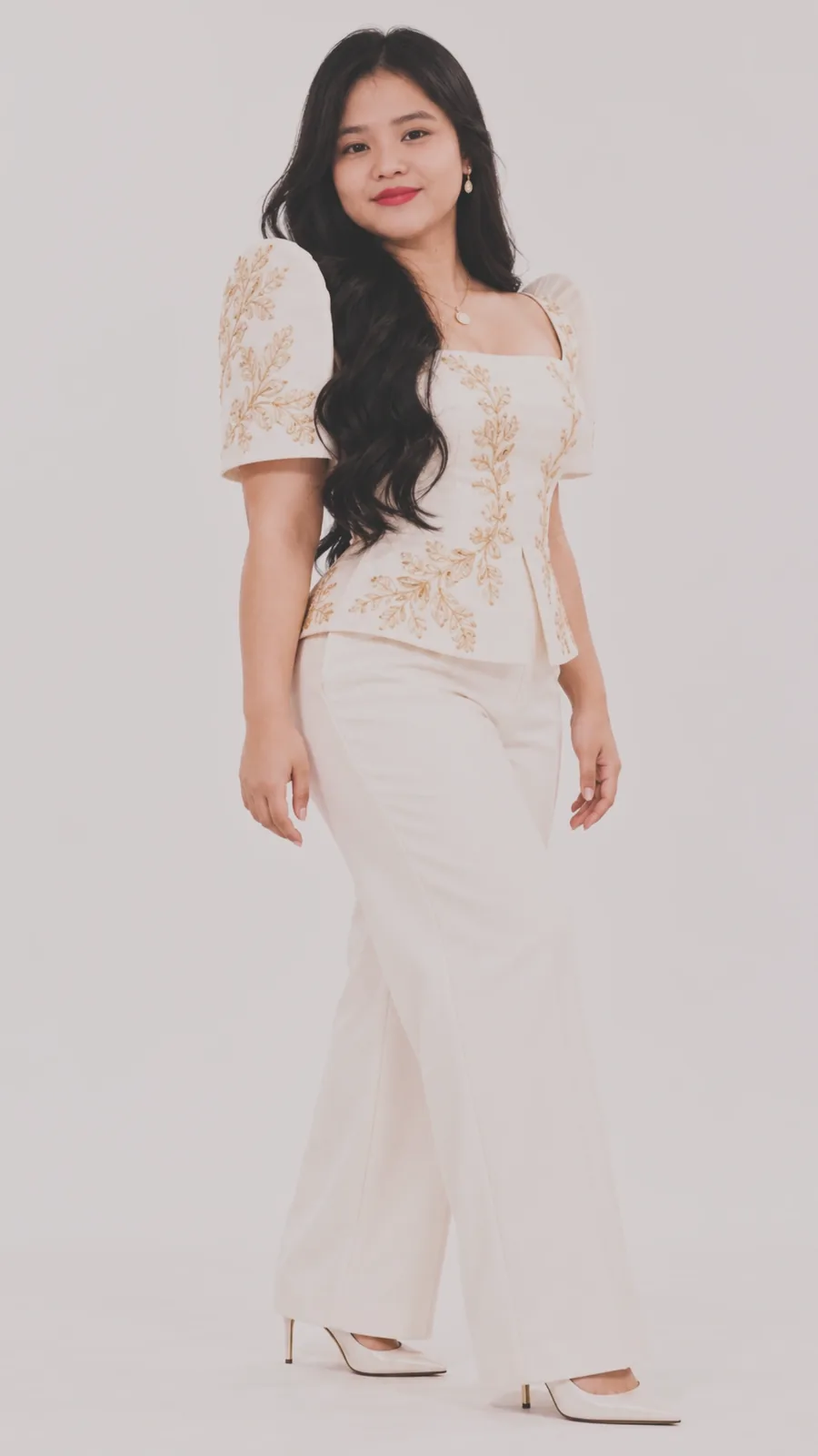 Alexa Pineda in a cream Filipiniana with gold embroidery